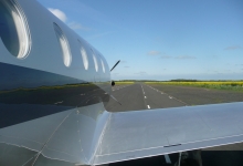 Light aircraft taking off from Charterhall